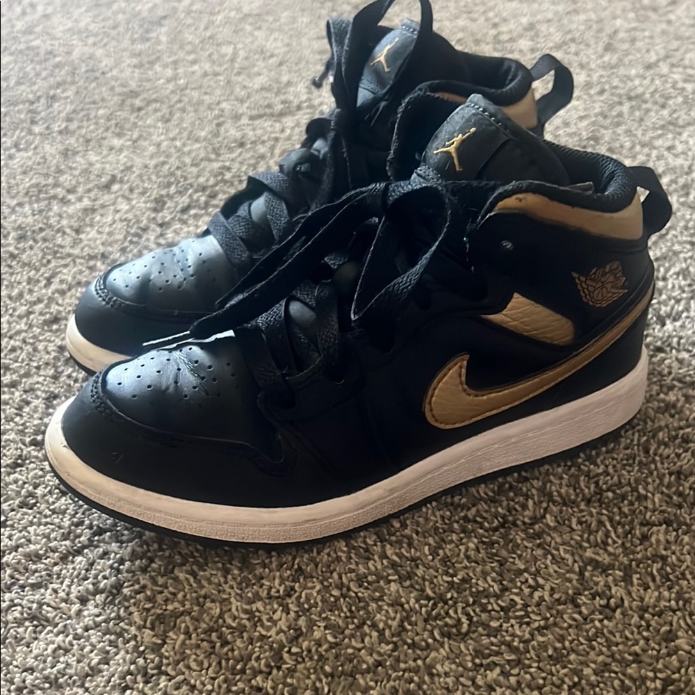 Nike Black and Gold High-Top Sneakers